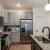 granite kitchen counters and stainless appliances