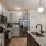 granite kitchen counters and stainless appliances