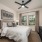 bedroom with plus carpet and view through windows