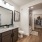 Spacious bathroom with granite counters and garden tub
