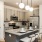 under cabinet lighting in spacious kitchen with island